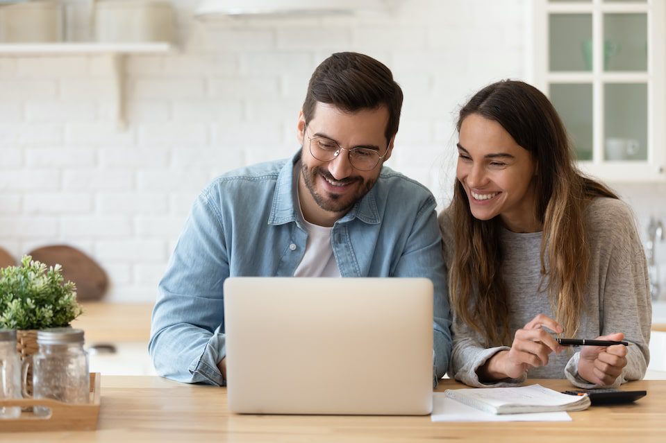 A couple on a computer 